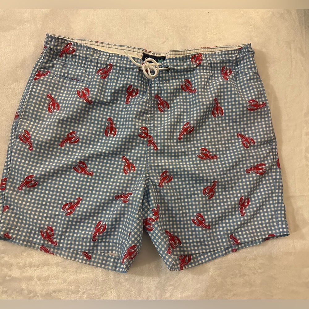 Charleston Large Lobster swim trunks. Blue. 5” length. Excellent condition.